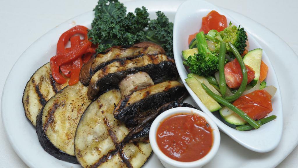 Grilled Gardena · Eggplant and portabella mushroom brushed with olive oil, garlic and Italian spice.
