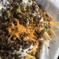Fries With Carne Asada, Sour Cream & Chicken · 