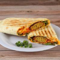 Falafel Wrap · A vegetarian dish blend of fresh garbanzo beans, vegetables and seasonings, deep-fried and t...