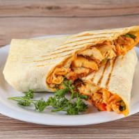 Chicken Shawarma Wrap · Chicken breast marinated in our special Mediterranean seasonings, flame-broiled on a vertica...