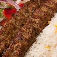 Chicken Kabob Rice Bowl · Our Famous Chicken Kabobs served on bed of rice! Includes Chopped Salad, Sumac Onions, and P...