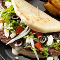 Side Gyros Meat · Layers of select beef and lamb, perfectly seasoned with zesty spices; broiled on a vertical ...