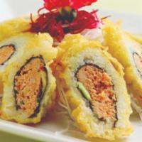 Crazy Las Vegas Roll · Deep Fried Spicy Crab Meat, Cream Cheese, and Avocado roll topped with sweet, eel, and spicy...