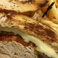 Turkey Melt · Roast turkey, grilled tomatoes, grilled onions, provolone cheese and Russian dressing.