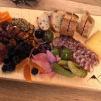 Small Board · Two meat and two cheese selections served with accouterment.
