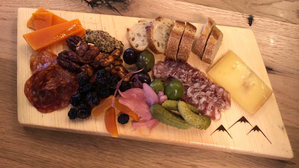 Small Board · Two meat and two cheese selections served with accouterment.