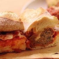 Braised Meatball Sandwich · provolone, tomato sauce