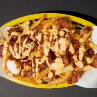 Bacon Chicken Cheese Fries · 2 diced chicken tenders, bacon, fries, with creamy cheese sauce drizzled on top
