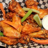 Chicken Wings · 8 Deep fried wings and tossed in your choice of sauce or rub.