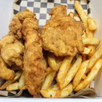 House Made Chicken Strips · Fresh chicken tenders hand dipped in buttermilk and our signature breading, served with frie...