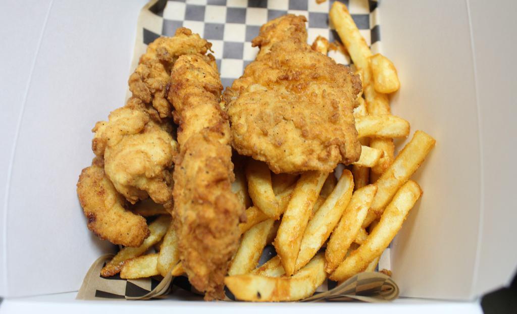 House Made Chicken Strips · Fresh chicken tenders hand dipped in buttermilk and our signature breading, served with fries and choice of dipping sauce. Try them tossed in Buffalo sauce for added flavor!