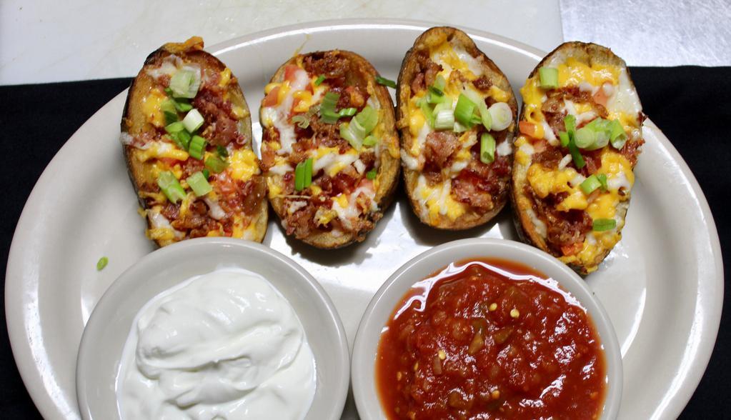 Baked Potato Skins · Large potato skins baked with bacon, jalapenos, tomato and shredded cheese, served with salsa and sour cream.