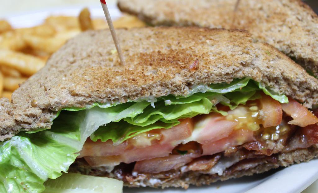 Blt · Thick, smoked bacon with lettuce, tomato and mayo on choice of bread. Add avocado or fried egg for an additional charge.