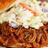 Amazing Pulled Pork · Slow roasted and house-smoked pulled pork tossed in BBQ sauce and topped with our house-made...