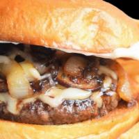 Mushroom Swiss Burger · Beef patty topped with sauteed mushrooms and Swiss cheese.