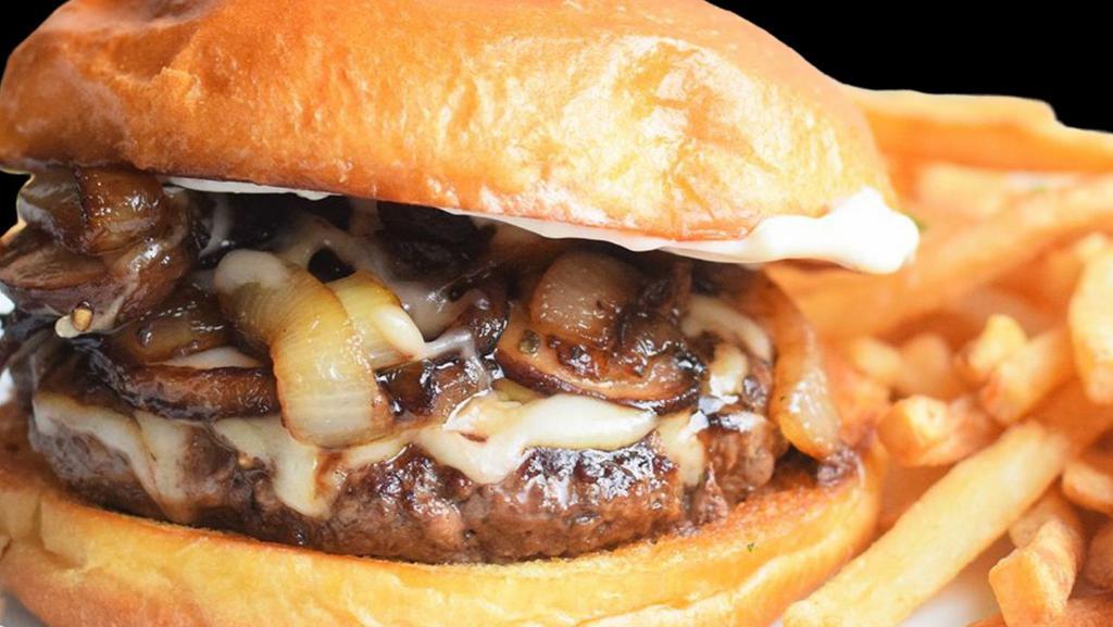 Mushroom Swiss Burger · Beef patty topped with sauteed mushrooms and Swiss cheese.