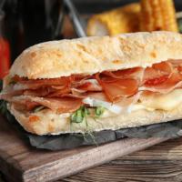 Scorched Pig Sandwich · Delicious sandwich made with fresh ciabatta, ghost pepper bacon, ham, tomato-onion preserve,...