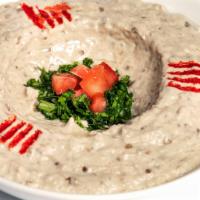 Baba Ghanoush · Vegan. Roasted eggplant with tahini lemon and garlic. Served with pita bread and assorted ve...