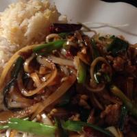 Mongolian Beef · Spicy. Beef slices sautéed with onions and scallions served over crispy rice noodles.