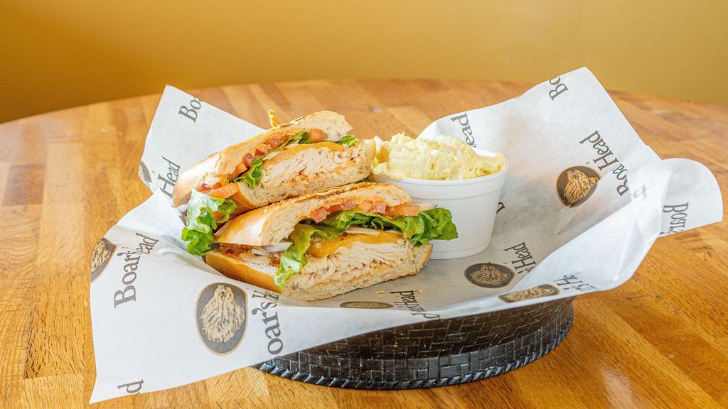 Chicken Chipotle · White meat chicken, chipotle cheddar, lettuce, tomato, red onions, chipotle aioli, choice of side.