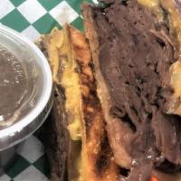 London Broil · Extra lean roast beef, caramelized onions, wisconsin cheddar, aju. Choice of side: kettle ch...