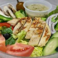 Grilled Chicken Salad · Grilled and sliced chicken breast.
