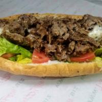 Hoagie Philly · Specialty. Grilled onions, lettuce, tomato, American cheese.