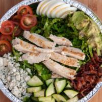 Grilled Chicken Cobb · Grilled chicken, bacon, guacamole, blue cheese, egg, cucumber and tomato on romaine, house r...