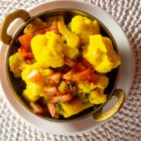 Gobhi Aloo · Vegetarian. Cauliflower & potato cooked with onions, tomato, ginger & garlic.
