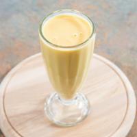 Mango Lassi · Mango pulp, sugar & homemade yogurt.