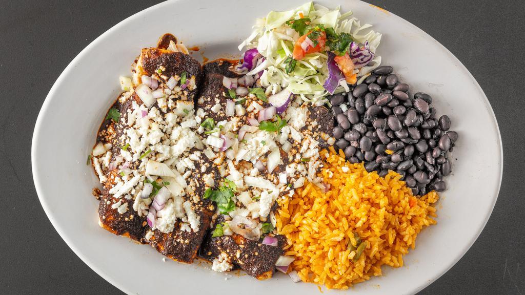 Enchiladas · Vegetarian. Choose from enchiladas de molé, salsa verde, or
molé rojo. Topped with queso fresco, onions, and
cilantro. Served with rice, beans , cabbage salad
(chicken, pork, cheese, veggies)
