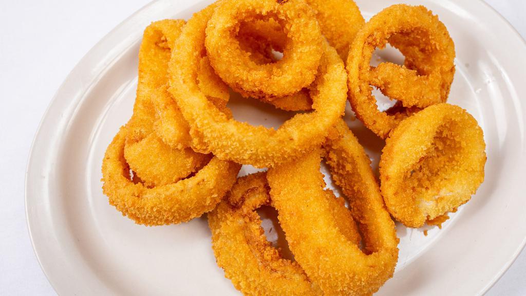 Onion Rings · 1 lb of thick-cut Battered Onions served Golden Brown.