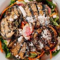 Marinated Eggplant Salad · Grilled eggplants marinated in a balsamic vinaigrette on a mixed green salad with watermelon...