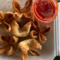 Crab Rangoon (6) · Crab and cream cheese filled wontons fried till golden brown.