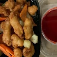 Sweet & Sour Chicken · Breaded chicken with red, green pepper, onion, and pineapple in sweet and sour sauce.