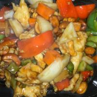 Royal Chicken · Thai version of cashew, chicken breast sauteed with cashews, red, and green peppers and onio...