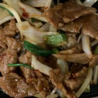 Mongolian Beef · Hot and spicy. Beef stir fried with green and yellow onion.