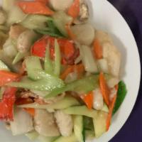 Seafood Combination · jumbo shrimp, sea scallops, lobster tail, and white fish, carrots, broccoli, snap peas and m...