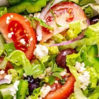 Greek Salad · A mixture of feta cheese, tomatoes, cucumbers, onions, olives, romaine lettuce and topped wi...