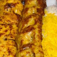 Chicken Breast And Chicken Thigh Kebab Combo & Chicken Combo · 1 skewer of chicken kebab and 1 skewer of chicken thigh kebab served with saffron white rice...