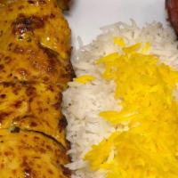 Chicken Thigh Kebab · 1 skewer of house marinated chicken thigh kebab served with saffron white rice and grilled t...