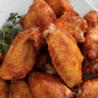 Mediterranean Wings · Mediterranean chicken wings tossed in your choice of plain, hot or BBQ sauce, served with ra...