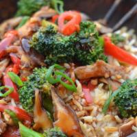 Stir Fry Vegetables Bowl Over Rice · Choice of protein with mixed vegetables over rice.