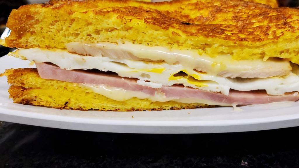 Montecristo Sandwich · Swiss cheese, turkey ham, and fried eggs on a french toast topped with powder sugar and a side of butter.

Thoroughly cooking food of animal origin, including but not limited to beef, eggs, fish, lamb, milk, poultry or shell stock reduces the risk of food-borne illness.