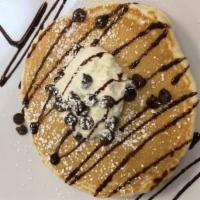 Chocolate Chip Pancakes · Topped with chocolate chips and whip cream.