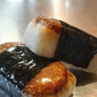 Spam Katsu Musubi · Breaded deep fried spam on Katsu sauce