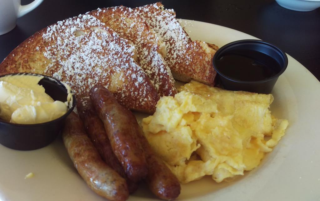 French Toast Combo · Two French toast served with two eggs any style, biscuits, and choice of bacon, sausage, or ham.