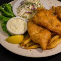 Beer Battered Fish & Chips · Fresh cut cod, hand dipped in craft beer battered served with tartar sauce, coleslaw, and cr...