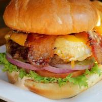 Ranchhand Bacon Burger (D) · Tillamook cheddar, thick-peppered bacon, fried egg, lettuce, onion, tomato, pickle, signatur...