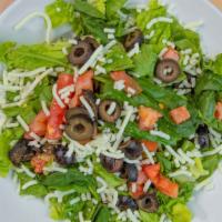 House · Tomato, black olive, and mozzarella on a bed of mixed greens.  Your choice of dressings (Hou...